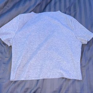 grey crop top.